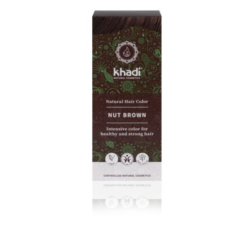 En boks med Khadi naturlig hårfarge i Nøttbrunt, med grønne og brune dekorative mønstre og ikoner for naturlige ingredienser.