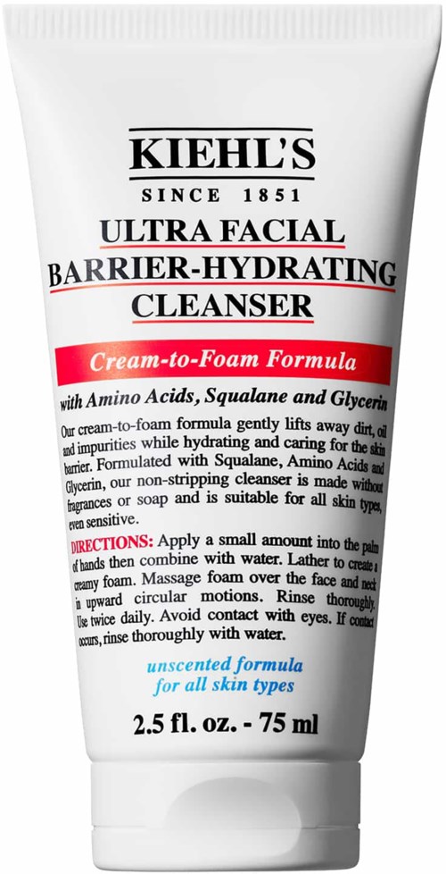 Kiehl's gezichtsreiniger in een witte tube met zwarte en rode tekst, bevat ingrediënten en instructies.