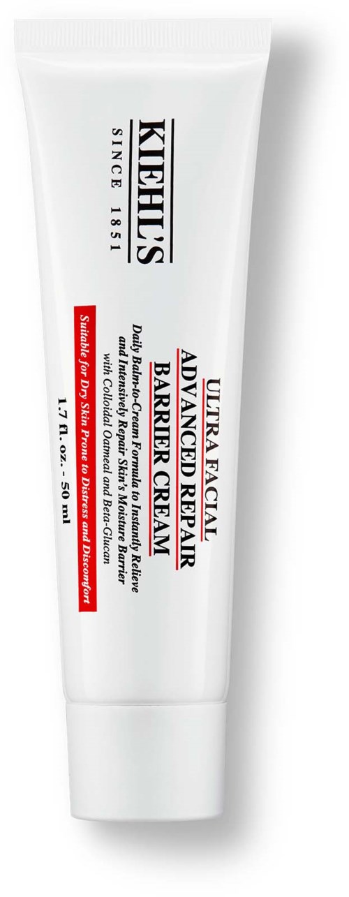 A white tube of skincare cream with black and red text, labeled as Kiehl's Ultra Facial Advanced Repair Barrier Cream.