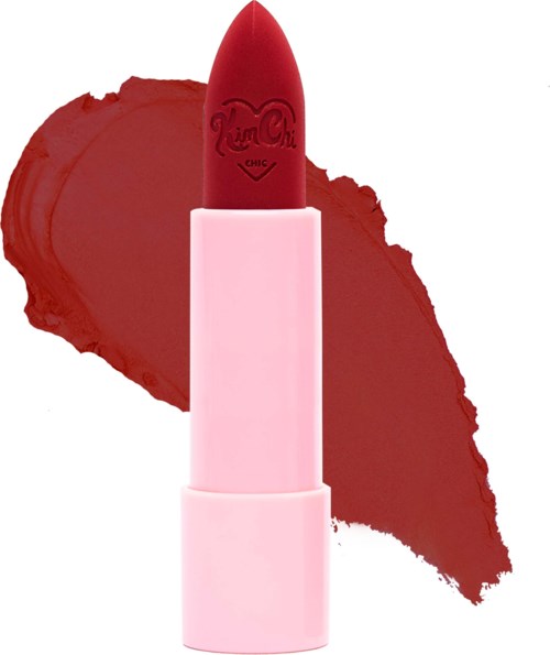 A red lipstick in a light pink tube with a lipstick mark background.
