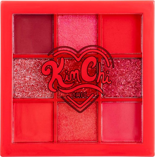 A red makeup palette with eight different shades of pink and red, featuring a heart and "Kim Chi Chic" logo.