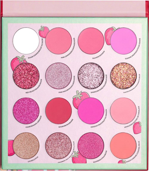 Colorful makeup palette with various shades of pink, red, purple, and glittery tones, decorated with strawberries.