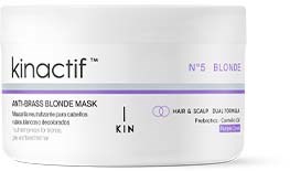 Een witte potje met 'kinactif' voor blond haar en hoofdhuid, met een paarse streep en productdetails.
