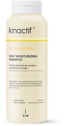 Een witte fles Kinactif Daily Moisturizing Shampoo met zwarte en gele tekst en een witte dop.