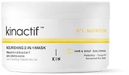 Een witte container met 'kinactif' voor haar- en hoofdhuidmasker. Het heeft een gele stripe en zwarte tekst.