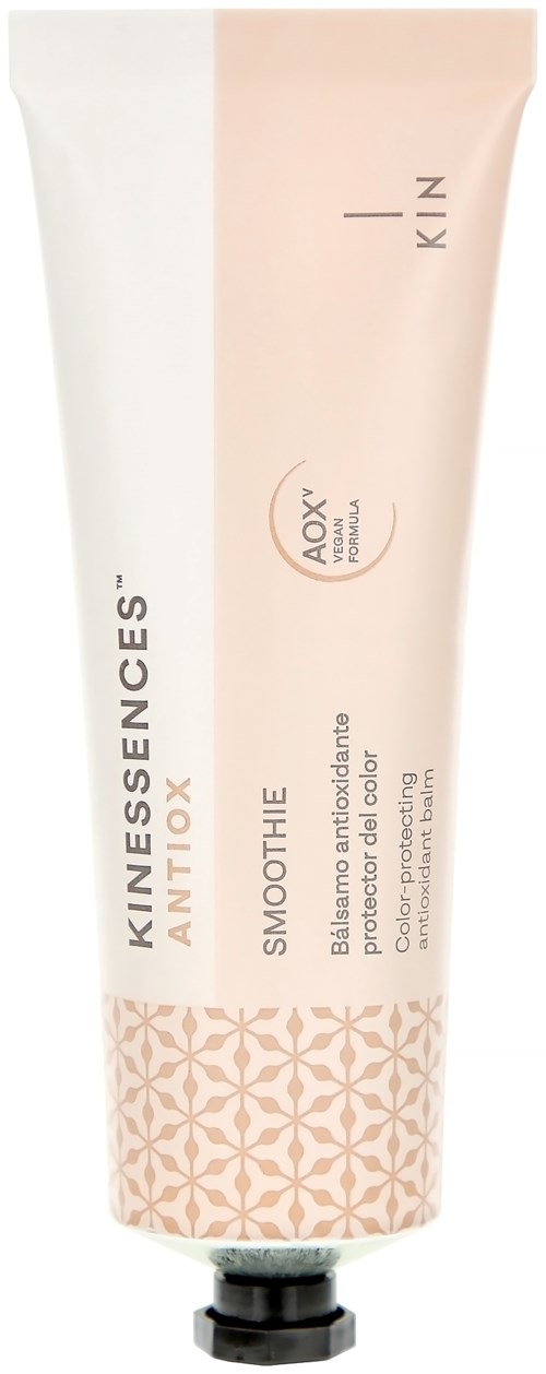 A beige and white tube of Kinesenses Antioxidant Smoothie with floral pattern, containing a skincare product.