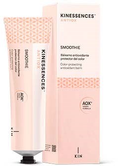 A pink tube and box for Kinessences Antiox Smoothie, a body antioxidant protective balm.