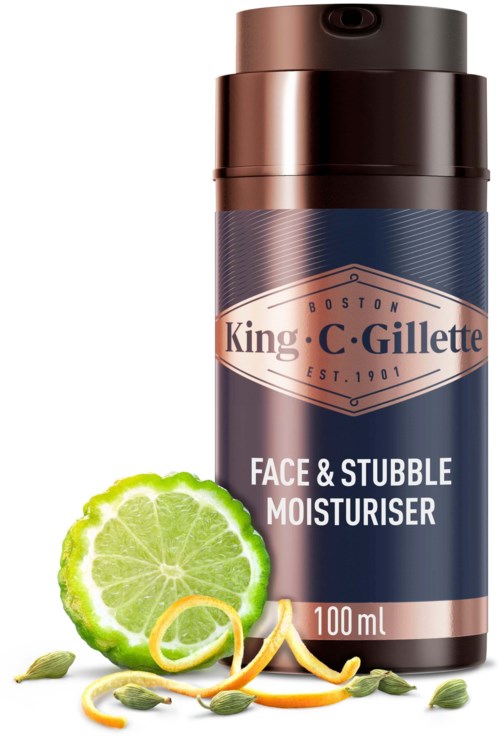Braune Flasche Gesichts- und Stubble-Feuchtigkeitscreme mit Limette, Zitronenschale und Samen davor.