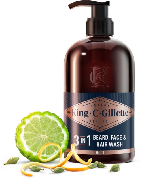 Braune Flasche mit Pumpaufsatz, beschriftet "King C. Gillette 3 in 1 Beard, Face & Hair Wash" mit Zitronenscheiben und grünen Kernen.