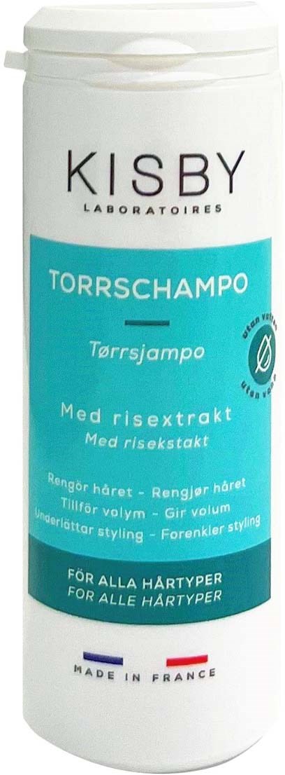 A white bottle with blue label displaying 'KISBY' and 'Torrschampo'. It is a dry shampoo for all hair types, made in France.