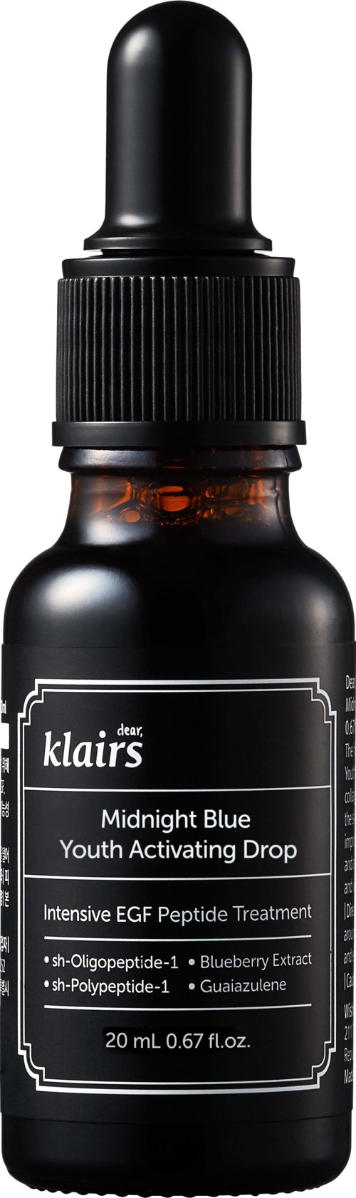 Tumma meripihkan väriinen pullo, jossa musta tipput Dropper-korkki sisältää nuoruuden aktivoivaa ihonhoitoseerumia. Etiketissä mainitaan Midnight Blue, Blueberry Extract.