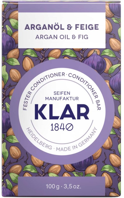 Box with purple and green colors, showing figs and nuts, labeled 'Arganöl & Feige, Argan Oil & Fig.'