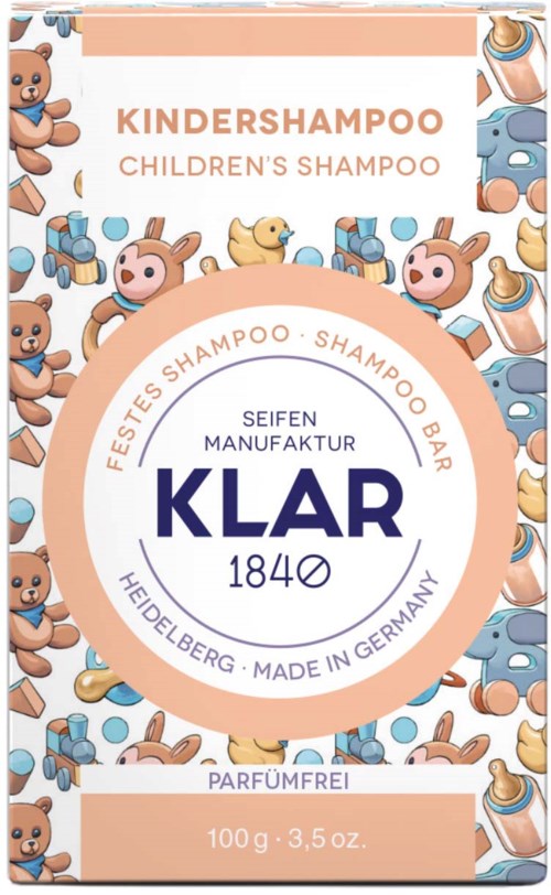 A colorful children's shampoo packaging with teddy bears, ducks, and baby accessories, and a label indicating it's fragrance-free.
