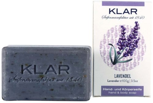 Lavender soap, box shows a lavender flower, the soap is gray with black specks, and has the brand 'KLAR' on it.