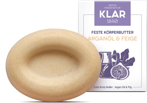 Renkaan muotoinen saippua figu- ja arganöljyllä olevaa vartalovoitetta varten.