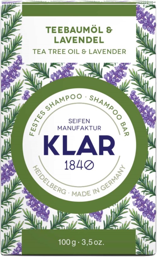 A label with green and purple lavender illustrations, mentioning tea tree oil and lavender, for shampoo soap from Germany.