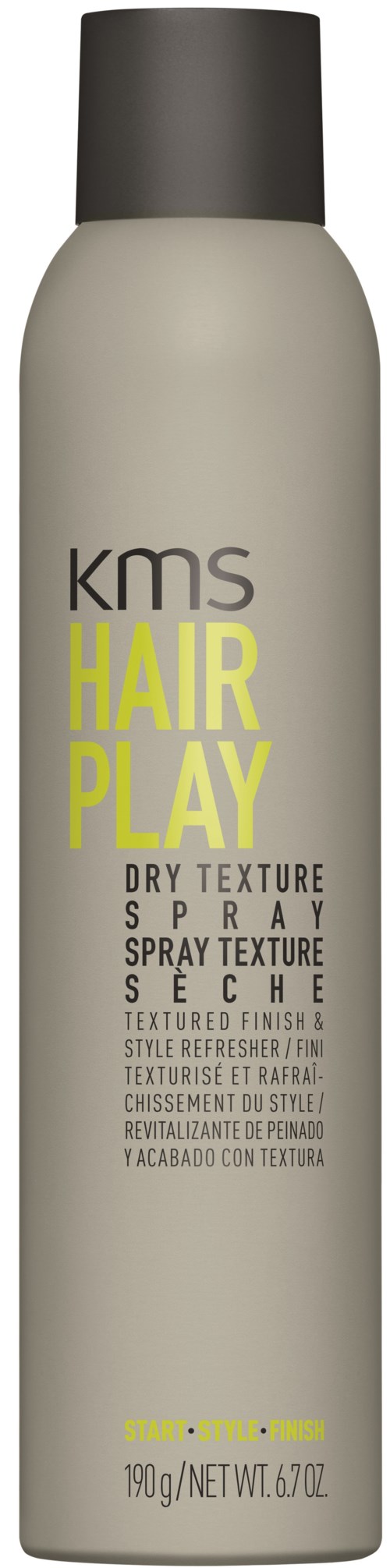 Een lange grijze fles met zwarte dop, gemerkt "KMS Hair Play" voor droog haar textuurspray.