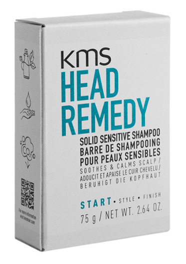 Wit doosje met KMS Head Remedy shampoo voor gevoelige hoofdhuid, 75 gram, met blauwe en zwarte tekst en iconen.