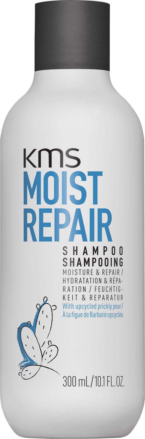 Shampoo fles met label KMS Moist Repair, vlinderillustratie en informatie over vocht en herstel.