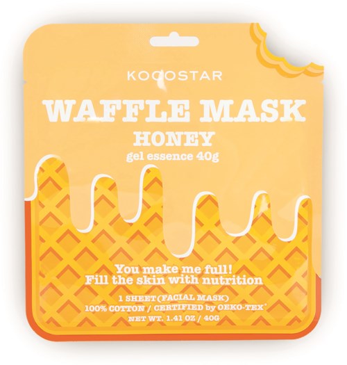 Verpakking voor een honing-waffel masker met een licht geel-oranje ontwerp en speelse lettertype.