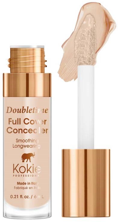 Eine Foundationtube mit beige Flüssigkeit und Pinselapplikator.