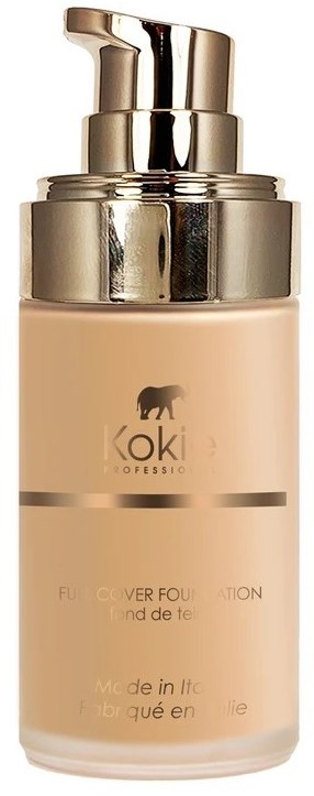 Een beige foundationfles met een zilveren pomp en gouden dop, met een zwart olifantenlogo.