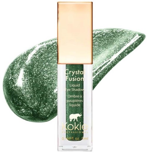 Grön flytande ögonskugga med guldlock, märkt Kryolan Crystal Fusion, framför ett prov. Enkel design.