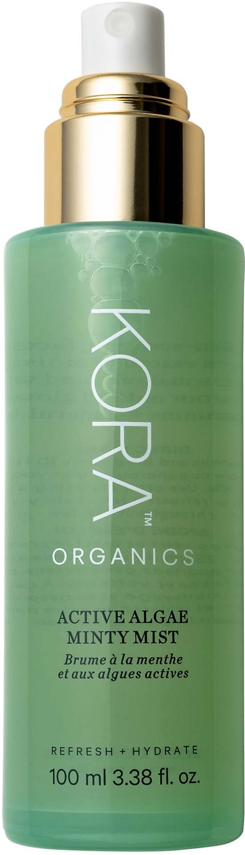 Eine grüne Flasche mit weißem und goldenem Pumpkopf. Es ist KORA Organics Active Algae Minty Mist, 100 ml.