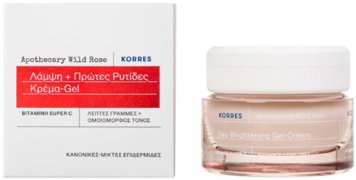 Een potje Korres Gel Cream naast de doos, met witte en rode verpakking, gelabeld als vitamine C-verhelderende gel.