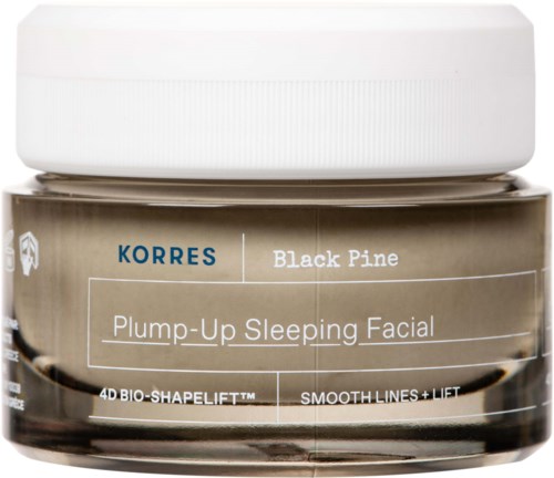 Een potje Korres Black Pine Plump-Up Sleeping Facial. Het vermeldt huidverzorging, gladde lijnen en bio-shapelift.