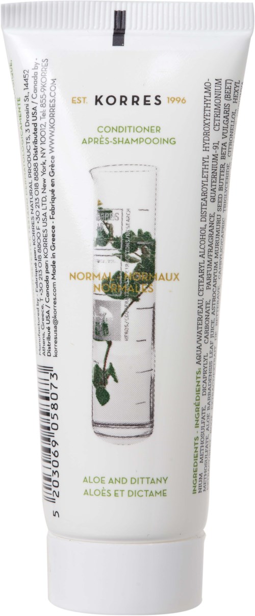A white tube of Korres conditioner with a glass of water and green plant image on front.