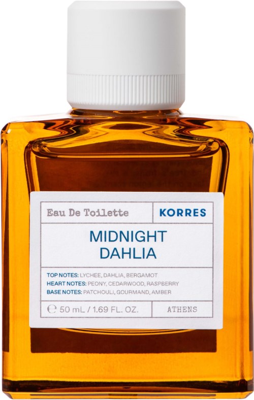 A small, orange perfume bottle with a white cap and a label reading 'Midnight Dahlia' by Korres.