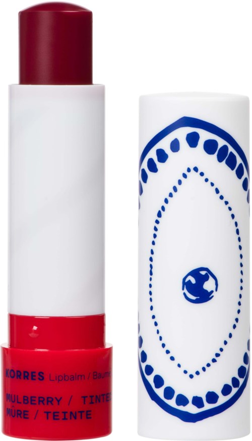 Two cylindrical objects, one with red cap and bottom, other with blue decorative design, are shown side by side.