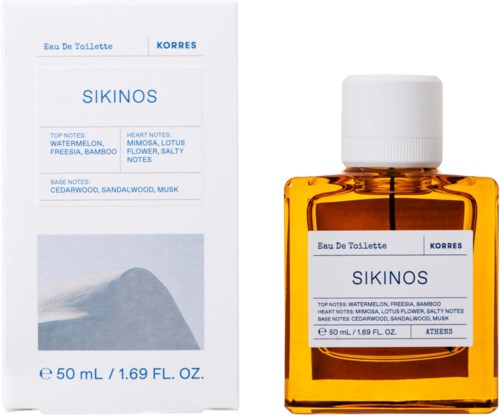 Eine kleine orangefarbene Parfüfflasche neben der Verpackung mit 'Sikinos' beschriftet, Duftnoten und Volumen.