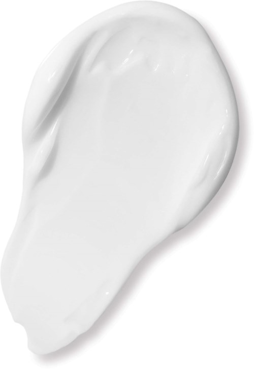 En vit kräm eller lotion smutsad på en vit yta, möjligen en hudvårds- eller kosmetikprodukt.