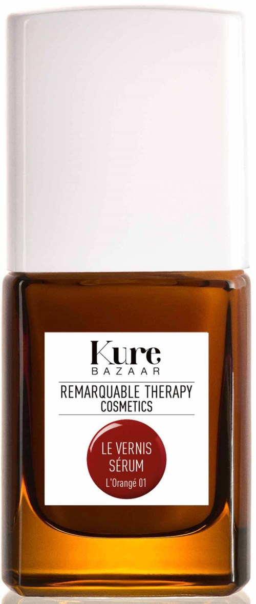 Eine kleine braune Glasflasche mit weißem Verschluss und weißem Etikett. Das Etikett sagt "Kure Bazaar" und "Serum".