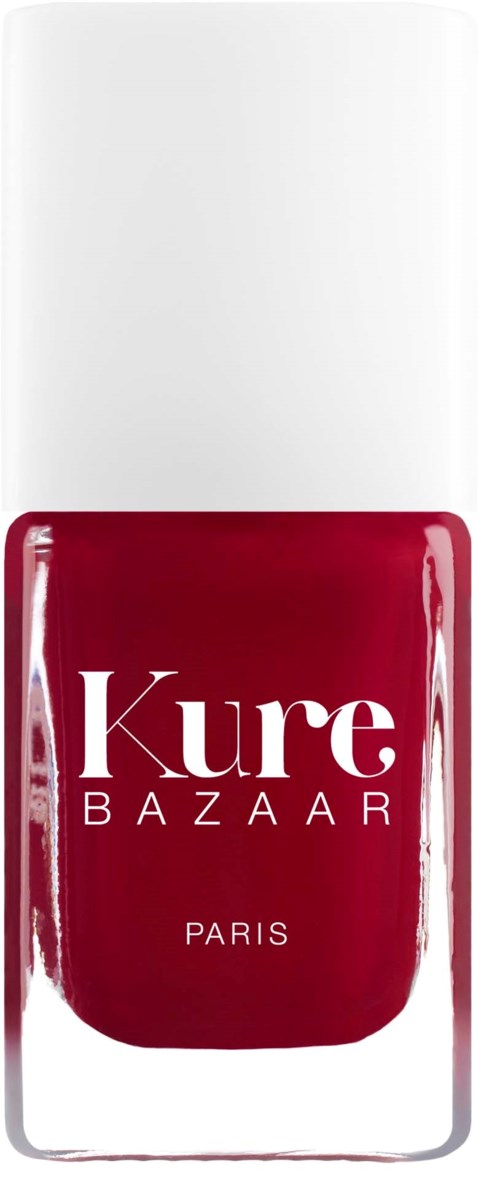 Rote Nagellackflasche mit weißem Deckel, gekennzeichnet Kure Bazaar Paris.