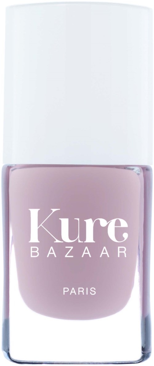 Eine Flasche hellrosa Nagellack von Kure Bazaar, Paris, mit weißem Deckel und klarem Glas.