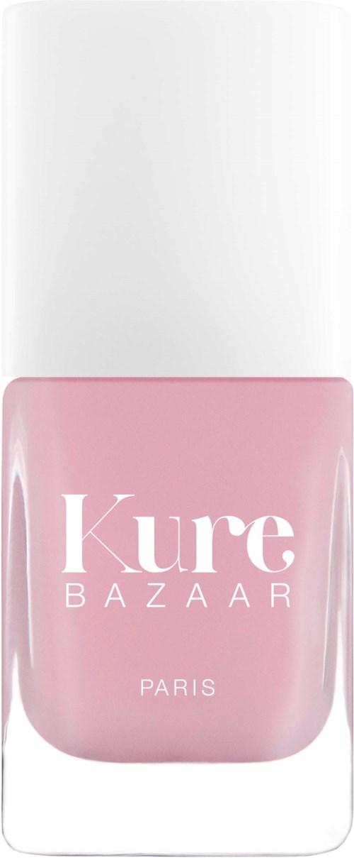 Hellrosa Nagellackflasche mit weißem Deckel, beschriftet 'Kure BAZAAR PARIS.'