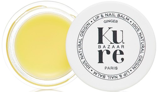 A small round container with yellow balm inside, labeled 'Ginger' from Ku re Paris, for lips and nails.
