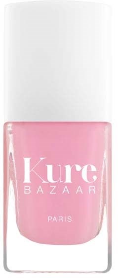 Kleiner rosa Nagellackflasche mit weißem Deckel, beschriftet "Kure BAZAAR PARIS."