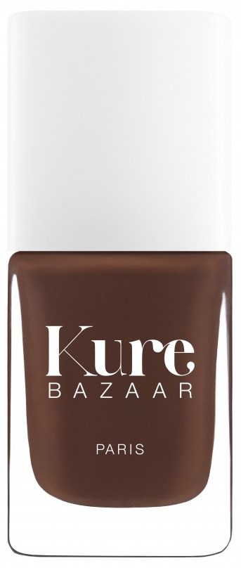 Ein Nagellackflasche mit brauner Farbe und weißem Deckel, mit der Aufschrift 'Kure Bazaar Paris'.