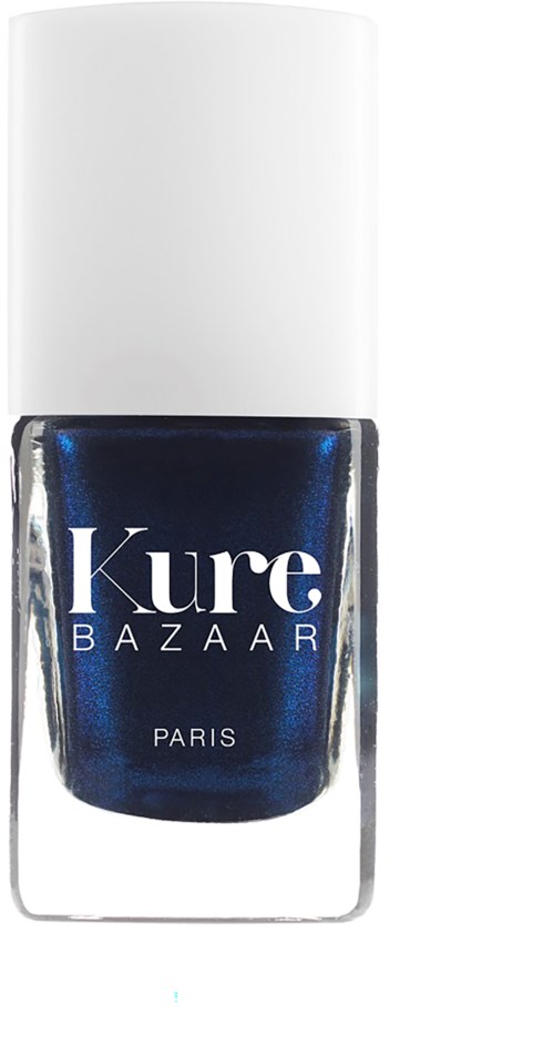 Eine dunkelblaue Nagellackflasche mit weißem Deckel, gekennzeichnet als Kure BAZAAR Paris.
