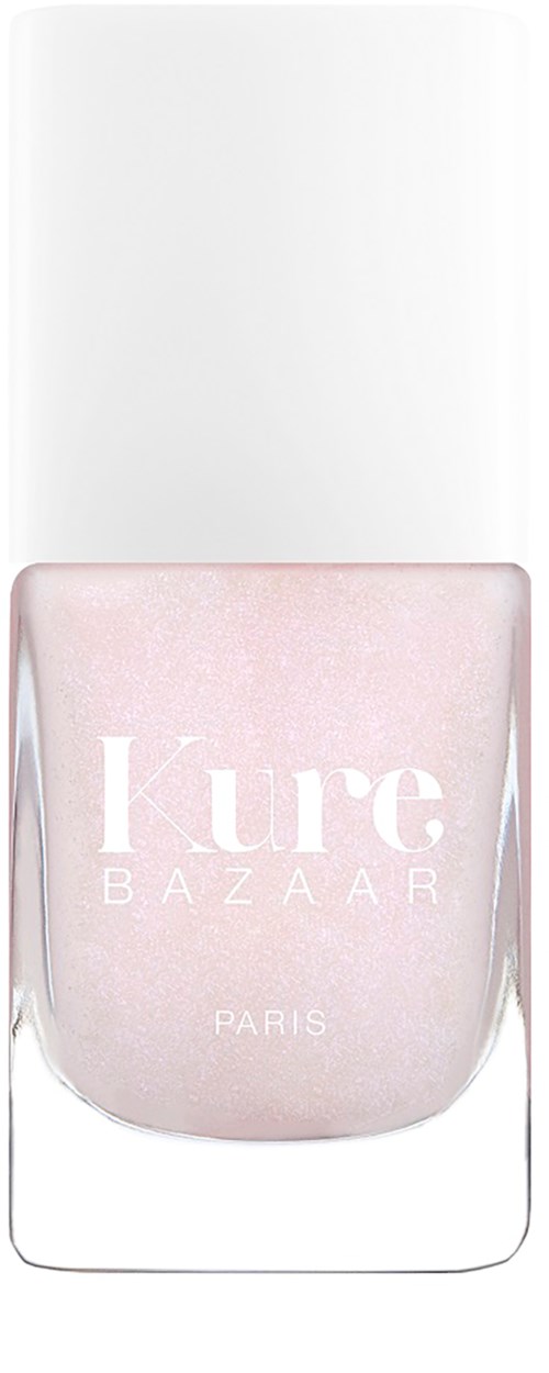Eine rosa Nagellackflasche mit weißem Deckel, beschriftet 'Kure BAZAAR PARIS.'