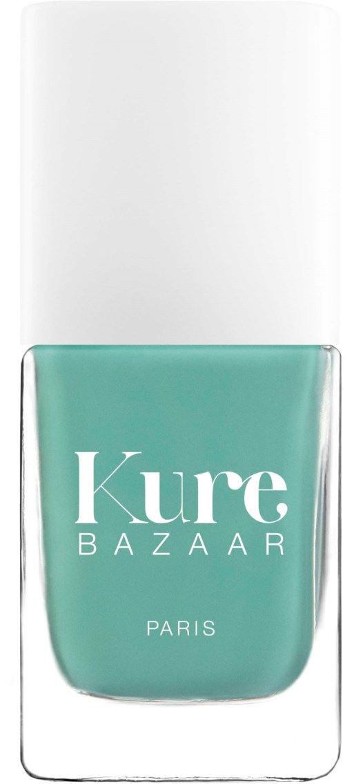 Eine Flasche grüner Nagellack mit weißem Deckel, mit der Aufschrift 'Kure Bazaar Paris'.