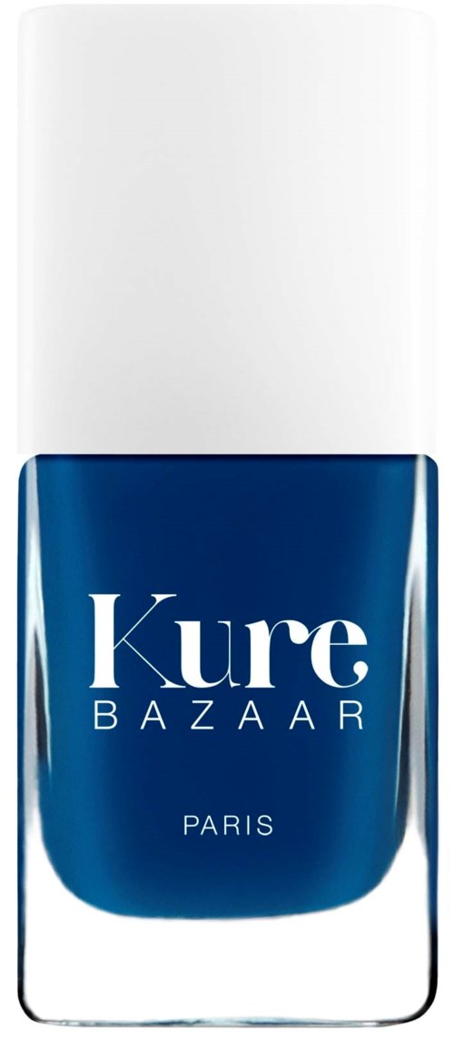 Blasblase mit blauer Farbe und weißem Deckel, beschriftet mit 'Kure BAZAAR PARIS'.