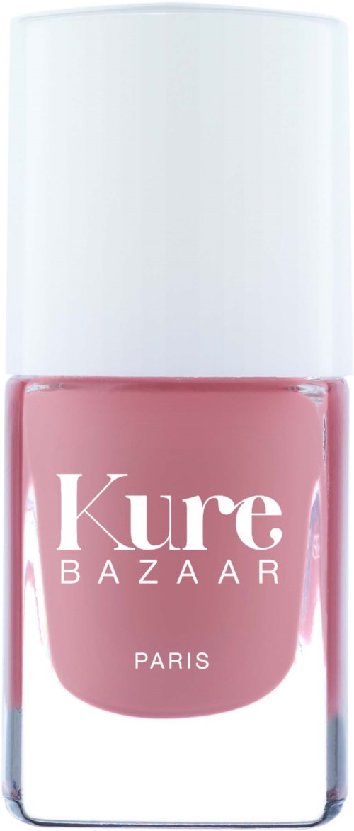 Ein Nagellackflasche mit pinkfarbenem Nagellack und weißem Deckel, gekennzeichnet Kure Bazaar Paris.