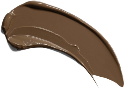 Ett stryk av brunt chokladspread på en vit yta.