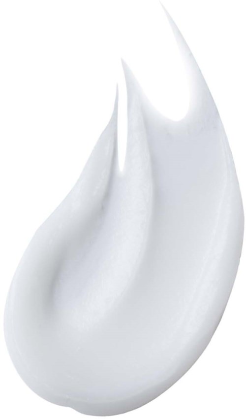 En vit, krämig klick, möjligen av vispad grädde eller lotion, med slät, blänkyta och kurvor.
