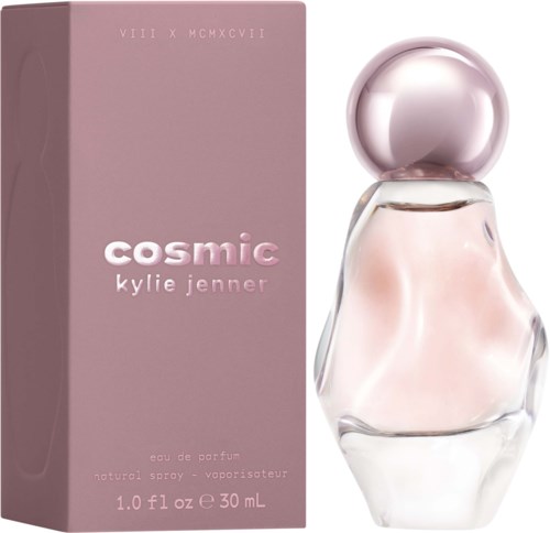 Pink perfume bottle next to a pink box with white text, labeled "Cosmic" by Kylie Jenner.